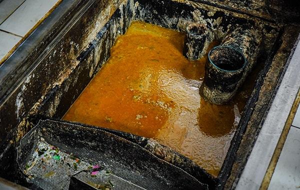 many local towns have regulations requiring regular grease trap cleaning for commercial kitchens